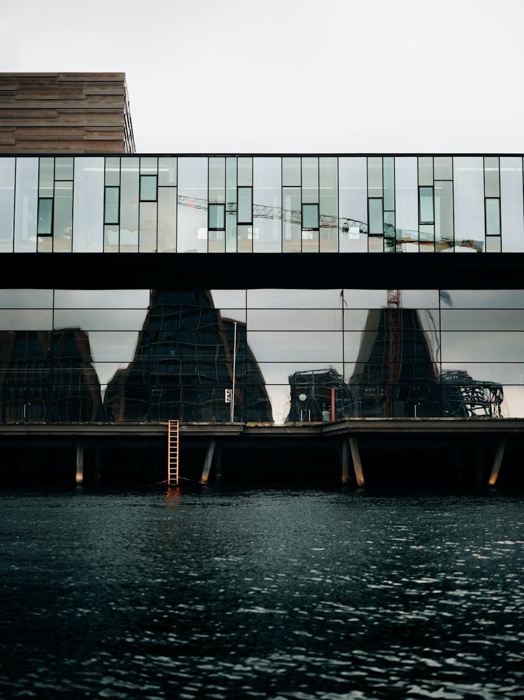 Modern glass office building exterior in a Scandinavian city