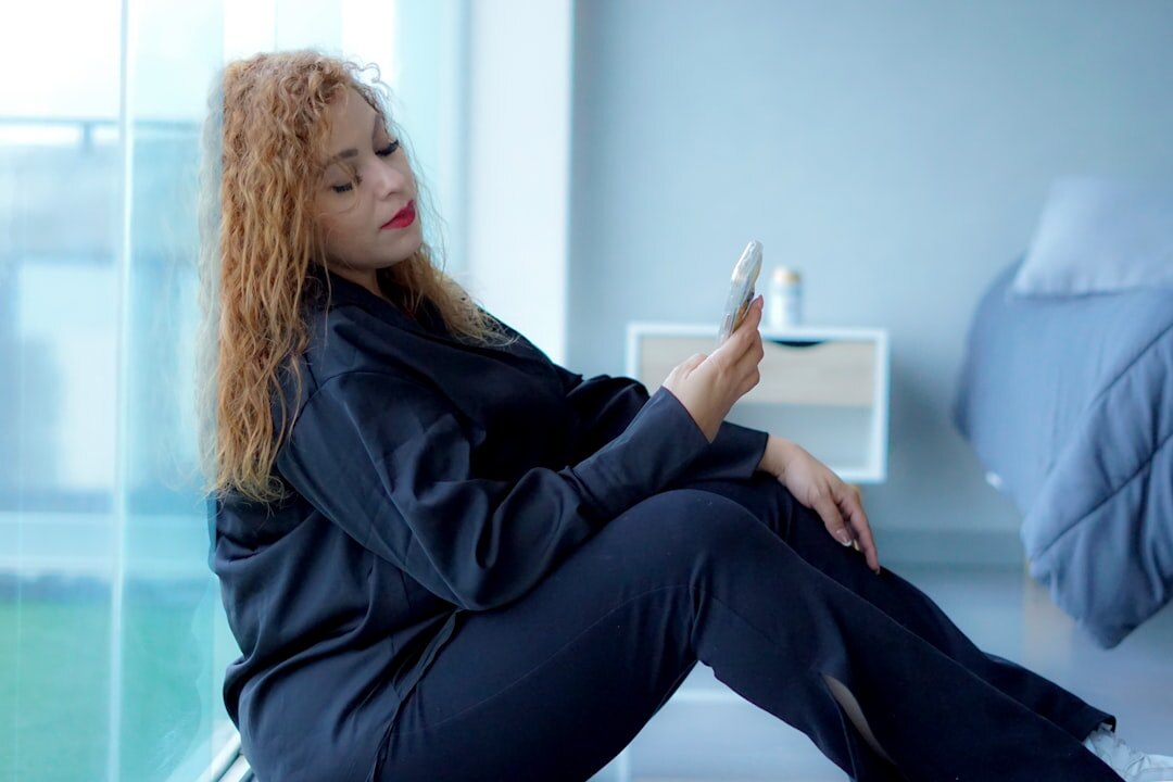 Businesswoman using a tablet in a modern lounge